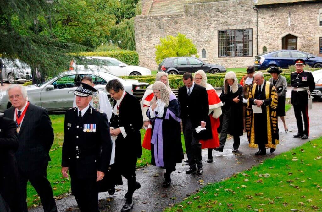 The procession enters All Saints Church for the service.