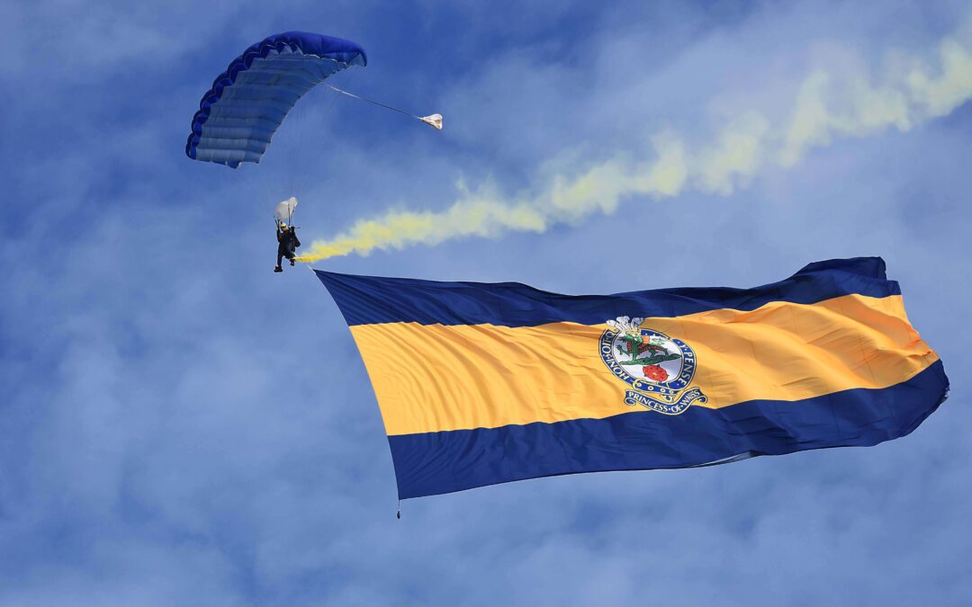 Regimental Flag descends from the sky aided by a Flying Tiger parachutist. (c) Barry Duffield DL.