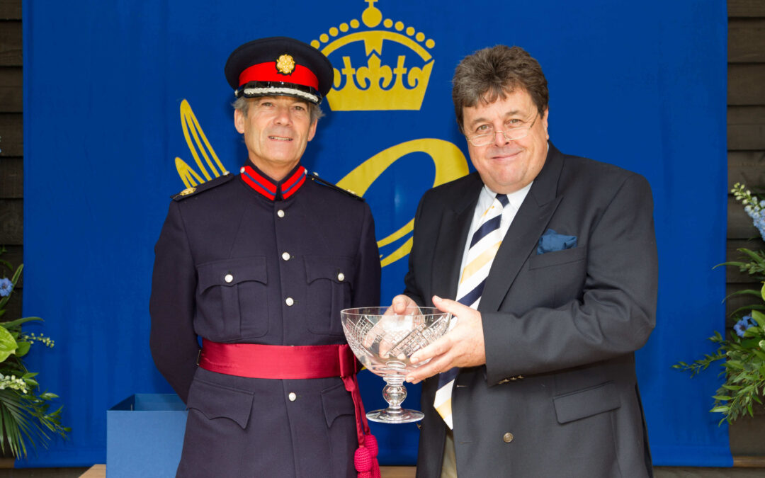 Pictured left is Vice Lord-Lieutenant Richard Oldfield, having presented the crystal bowl for the Queen's Award for Enterprise in International Trade to Marcus Coles, right, CEO of Maviga. (c) David Bartholomew