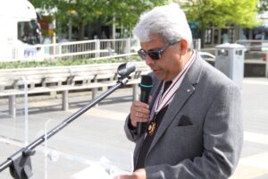 Dr Bhargawa Vasudaven DL, representing the Lord-Lieutenant, speaking at the event. (c) Kent Equality Cohesion Council.