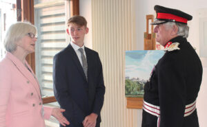 The Lord-Lieutenant talking to Margaret Williams, Chair of Governors, and Jacob Eason, Year 12, about the Wye School art exhibition at 10 Downing Street.(c) Wye School.