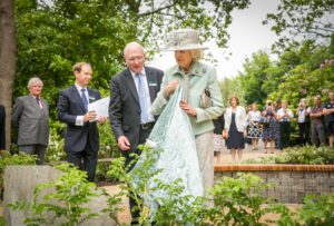 Princess Alexandra unveiling the plaque for the new Princess Alexandra Garden, with from left to right: The Lord-Lieutenant, Viscount De L'Isle; Sir David Steele, Leeds Castle Chief Executive and Mr Niall Dickson, Leeds Castle Foundation Chairman. (c) Leeds Castle.