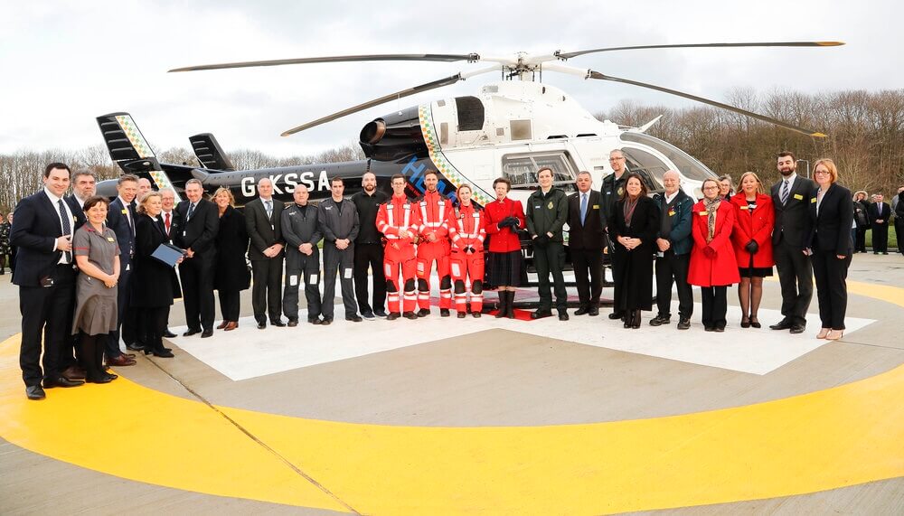 HRH the Princess Royal with crew and staff members at the new Maidstone Hospital helipad. (c) Maidstone and Tunbridge Wells NHS Trust.